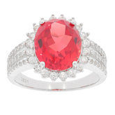 Elegant oval red spinel sterling silver ring with accent stones, perfect for adding luxury to your jewelry collection.